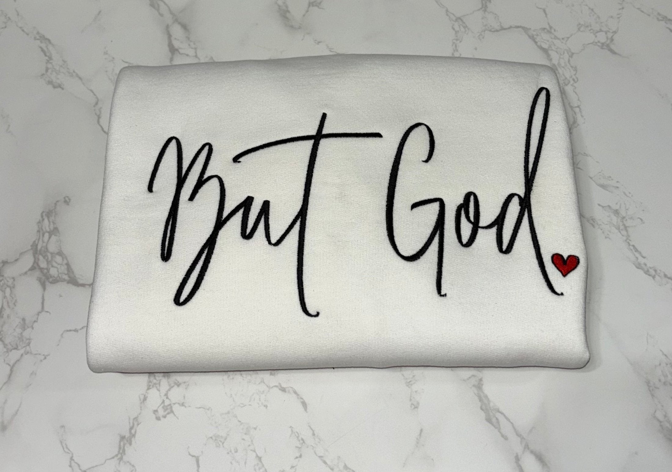 BUT GOD EMBROIDERED SWEATSHIRT