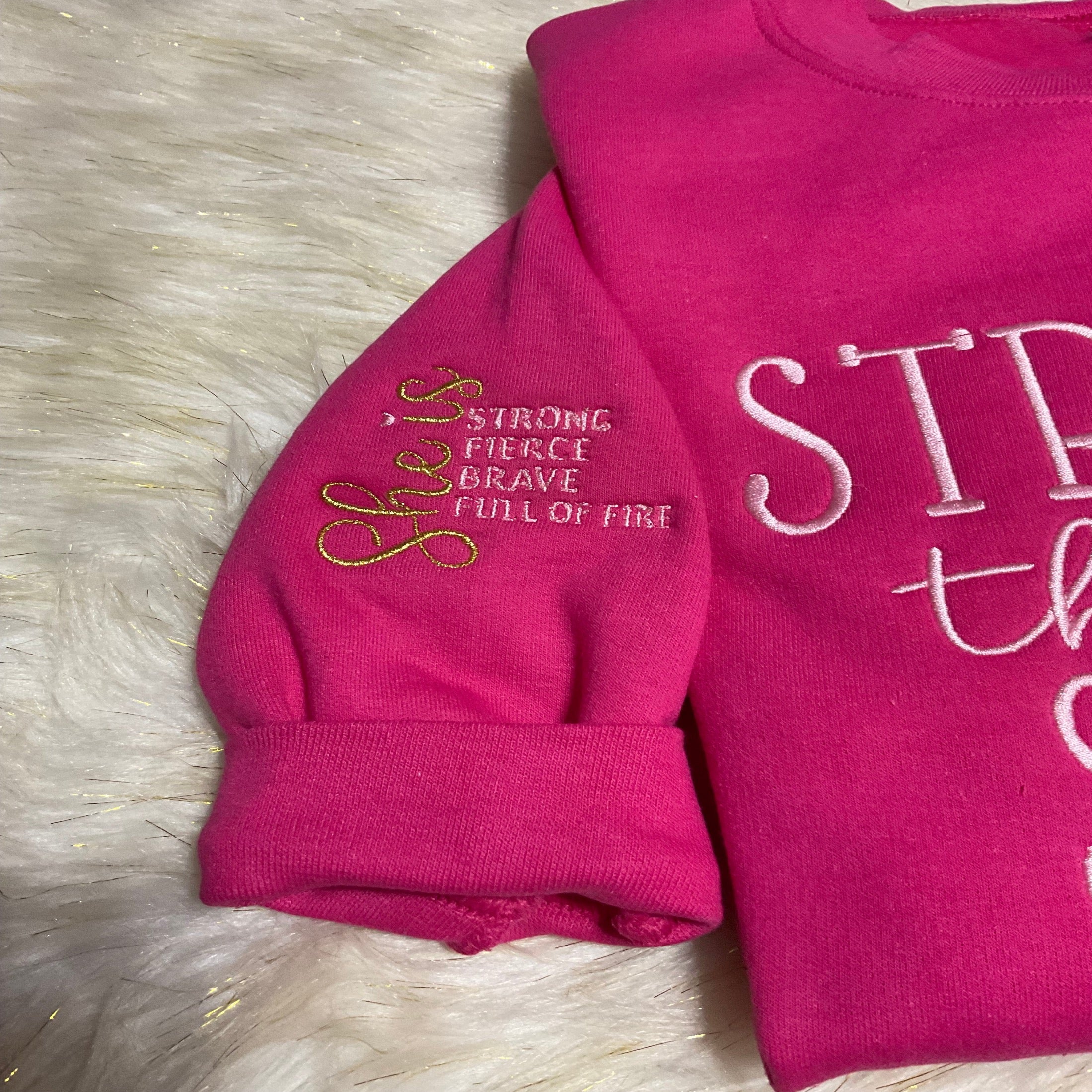 STRONGER THAN THE STORM EMBROIDERY SWEATSHIRT