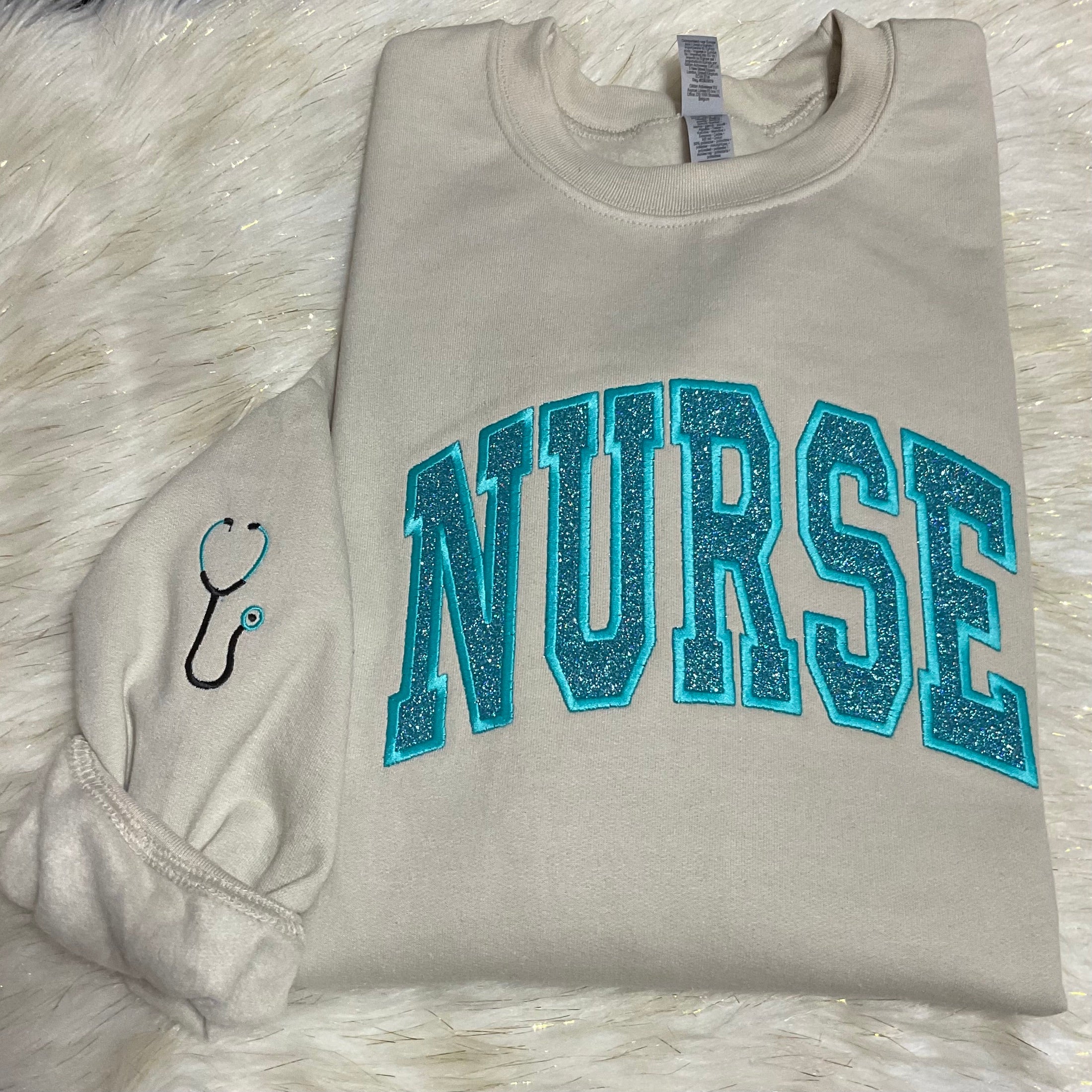 NURSE GLITTER EMBROIDERED SWEATSHIRT